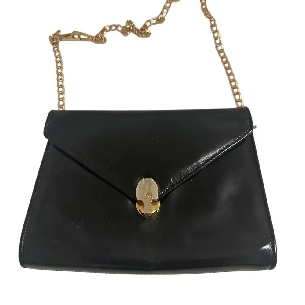 Black and Gold Crossbody Bag with Skull Clasp - Picture 2 of 11